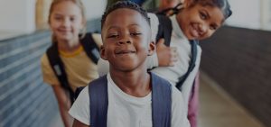 Happy students in a school hallway